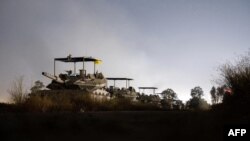 Slika koju je izraelska vojska objavila 8. maja 2024. navodno prikazuje izraelske snage u Rafi u južnom pojasu Gaze.