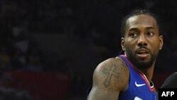 Oct 22, 2019; Los Angeles, CA, USA; Los Angeles Lakers forward LeBron James (23) is defended by LA Clippers forward Kawhi Leonard (2) in the second half at Staples Center. The Clippers defeated the Lakers 112-102. Mandatory Credit: Kirby Lee-USA TODAY Sp
