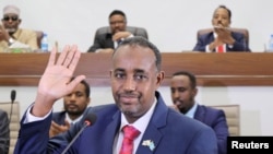 FILE - Somalia's Prime Minister Mohamed Hussein Roble.