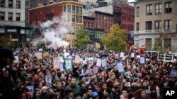 Protestors affiliated with the Occupy Wall Street Movement gather in Union Square in New York City on November 17, 2011.