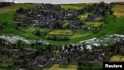 Sisa-sisa desa Rohingya yang terbakar tampak dalam foto udara dekat Maungdaw, bagian utara negara bagian Rakhine, Myanmar 27 September 2017. 