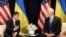 Ukraine's President Volodymyr Zelenskiy, left, gestures next to U.S. Vice President Mike Pence, during a bilateral meeting in Warsaw, Poland, Sunday, Sept. 1, 2019. 