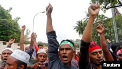 Rohingya Muslims living in Malaysia protest the treatment of Myanmar's Rohingya Muslims near the Myanmar Embassy in Kuala Lumpur, Malaysia, Sept. 8, 2017.