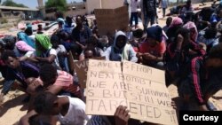 The migrants say they fled war, violence and abject poverty and risked their lives for the chance at a better life in Europe, before being captured and held in Tripoli. Photographed and transmitted to VOA July 7, 2019, in Tripoli, Libya.