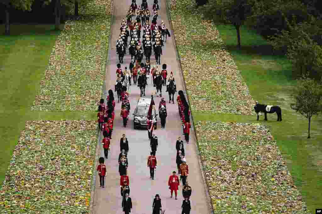 Emma, the monarch&#39;s fell pony, watches the Ceremonial Procession of the coffin of Queen Elizabeth arrives at Windsor Castle for the Committal Service at St. George&#39;s Chapel, Sept. 19, 2022.