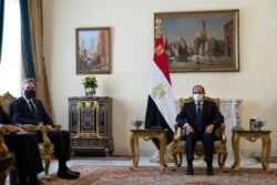 Secretary of State Antony Blinken, left, is seated during a meeting with Egyptian President Abdel Fattah el-Sissi at the Heliopolis Presidential Palace, May 26, 2021, in Cairo, Egypt.