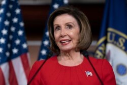 FILE - House Speaker Nancy Pelosi, D-Calif., talks to reporters on the morning after the first public hearing in the impeachment probe of President Donald Trump.