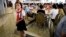 A young North Korean student waits in the dining hall of the Ongnyugwan, a popular noodle restaurant, Sept. 1, 2014 in Pyongyang
