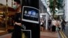 Stiker dengan pesan gerakan pro demokrasi di sebuah jalan di Hong Kong, Kamis, 2 Juli 2020. (Foto: AP)