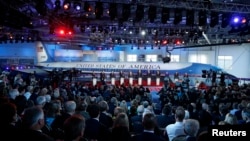Eleven Republican U.S. presidential candidates debate in front of President Ronald Reagan's Air Force One during the second official Republican presidential candidates debate of the 2016 U.S. presidential campaign, Sept. 16, 2015.