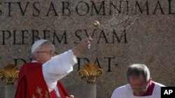 Pope Francis celebrates a Palm Sunday Mass in St. Peter's Square at the Vatican, April 9, 2017.