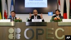 Russian Minister of Energy Alexander Novak, Khalid Al-Falih, Minister of Energy, Industry and Mineral Resources of Saudi Arabia and Minister of Energy of the UAE, Suhail Mohamed Al Mazrouei, from left, attend a news conference after a meeting of OPEC in Vienna, Dec. 7, 2018.