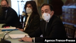 Spanish Foreign Minister Jose Manuel Albares, right, speaks during a meeting with US Secretary of State Tony Blinken (out of frame) at the State Department in Washington, on Jan. 18, 2022.