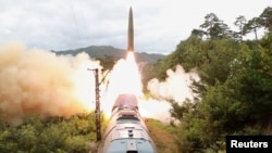 A missile is seen launched during a drill of the Railway Mobile Missile Regiment in North Korea, in this image supplied by North Korea's Korean Central News Agency on September 16, 2021.