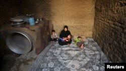 The casket of Rep. John Lewis, a pioneer of the civil rights movement and long-time member of the U.S. House of Representatives, moves over the Edmund Pettus Bridge by horse drawn carriage during a memorial service in Selma, Alabama.