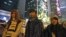 FILE - From right: Prince Wong, Joshua Wong and Isabella Lo walk at the occupied area outside government headquarters during their hunger strike in Hong Kong Wednesday, Dec.3, 2014.