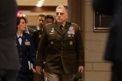 Joint Chiefs of Staff Chairman Gen. Mark Milley arrives to conduct briefings for members of Congress on last week's targeted killing of Iran's senior military commander Gen. Qassem Soleimani, Jan. 8, 2020, on Capitol Hill in Washington.