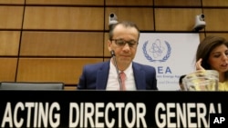 Acting Director General of the International Atomic Energy Agency, IAEA, Cornel Feruta from Romania waits for the start of the IAEA board of governors meeting at the International Center in Vienna, Austria, Sept. 9, 2019. 