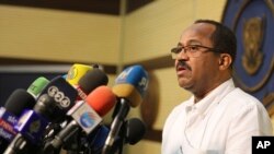 Sudanese Health Minister Akram al-Tom speaks during a press conference in Khartoum, Sudan, March 13, 2020. 