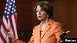U.S. House Minority Leader Nancy Pelosi speaks to reporers. Sharp differences remained between congressional Republicans and the White House in talks to avert the "fiscal cliff," Dec. 14, 2012.