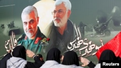 Iraqi women gather at the scene where Iran's Quds Force top commander Qassem Soleimani and Iraqi militia commander Abu Mahdi al-Muhandis were killed in a U.S. airstrike at Baghdad airport, Iraq February 13, 2020. REUTERS/Wissm al-Okili