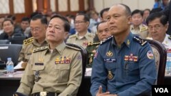 FILE PHOTO - National Police Chief of Cambodia Neth Savoeun, left, and National Military Police Commander Sao Sokha, right, at the Ministry of Interior in Phnom Penh, Cambodia, Thursday, August 25, 2016. (Leng Len/VOA Khmer)