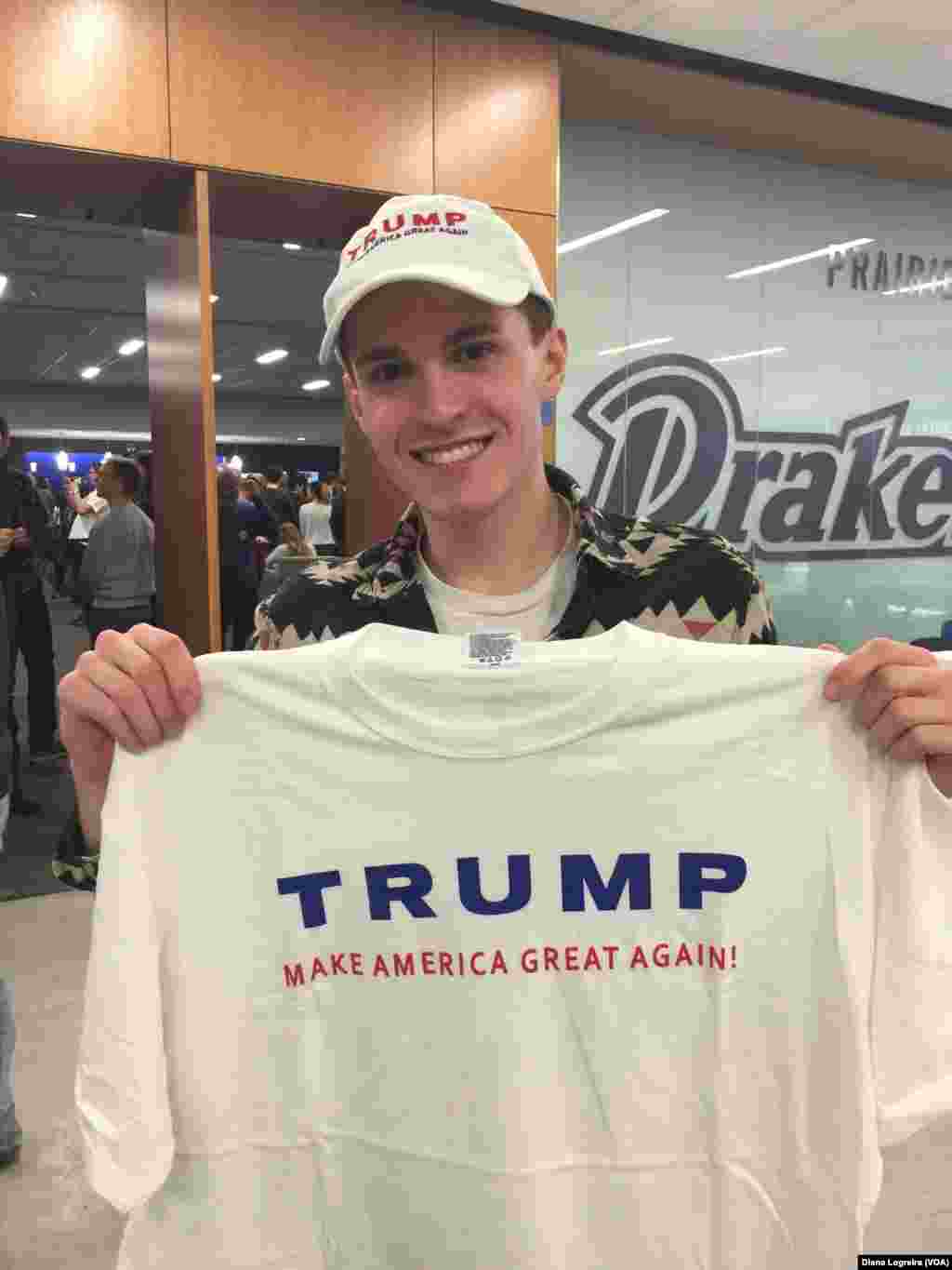 Alec Bognar, a supporter of Republican presidential candidate Donald Trump, poses at a rally in Des Moines, Iowa, Jan. 28, 2016.