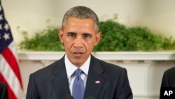 FILE - President Barack Obama speaks in the Roosevelt Room of the White House in Washington, Oct. 15, 2015.