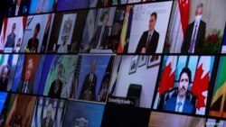 មេដឹកនាំមកពីប្រទេសជាច្រើននៅជុំវិញពិភពលោកចូលរួមកិច្ចប្រជុំកំពូលអាកាសធាតុតាមប្រព័ន្ធអ៊ីនធឺណិត ដូចបង្ហាញឲ្យឃើញក្នុងរូបភាពនេះ ពីសេតវិមាន រដ្ឋធានីវ៉ាស៊ីនតោន ថ្ងៃទី ២២ ខែមេសា ឆ្នាំ ២០២១។