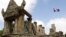 A Cambodian flag flutters near an entrance gate to Cambodia's Preah Vihear temple on the Cambodian-Thai- border in Preah Vihear province.