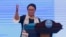 Wearing a Palestinian scarf, Indonesian Foreign Minister Retno Marsudi, gestures as she delivers her opening speech at Bali Democracy Forum held in Tangerang on the outskirts of Jakarta, Dec. 7, 2017. Marsudi condemned the U.S. recognition of Jerusalem as the capital of Israel in her speech at the opening of the forum.