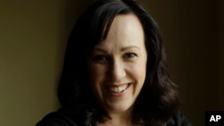 MJ Hegar, shot down in Afghanistan nine years ago, is running for a Texas congressional seat, on Aug. 9, 2018. 