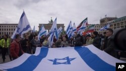 Mideast War Anniversary Global Reax