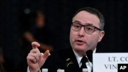 FILE - National Security Council aide Lt. Col. Alexander Vindman testifies before the House Intelligence Committee on Capitol Hill in Washington, Nov. 19, 2019.