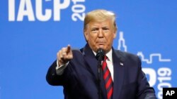 President Donald Trump speaks at the International Association of Chiefs of Police Convention Monday, Oct. 28, 2019, in Chicago. (AP Photo/Charles Rex Arbogast)