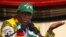 FILE: President Emmerson Mnangagwa addresses an election rally of his ruling ZANU-PF party in Mutare, Zimbabwe, May 19, 2018. 