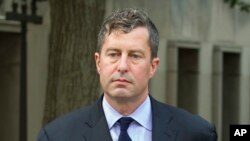 FILE - W. Samuel Patten leaves the federal court in Washington, Aug. 31, 2018.