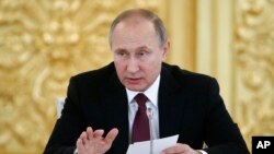 Russia's President Vladimir Putin delivers a speech during a session of the Council for Civil Society and Human Rights at the Kremlin in Moscow, Russia, Dec. 8, 2016.