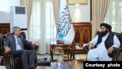 FILE - Senior Indian diplomat J.P. Singh, left, meets with the Taliban's acting foreign minister, Amir Khan Muttaqi, in Kabul, Afghanistan, on June 2, 2022. India views the Taliban as bringing some stability to Afghanistan after 20 years of civil war, observers say.