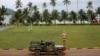 FILE - Sailors sit on a truck at the Cambodian Ream Naval Base in Sihanoukville, Cambodia, July 26, 2019. 