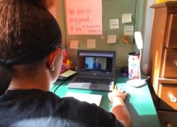 A student at Norristown Area High School takes part in virtual Spanish class at her home in Norristown, Pa., Sept. 3, 2020.