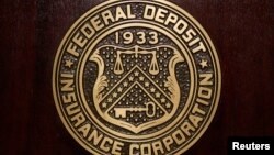 The Federal Deposit Insurance Corp (FDIC) logo is seen at the FDIC headquarters.
