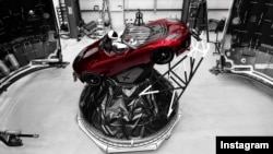 "Starman," sitting behind the wheel of a Tesla roadster, is headed toward an asteroid belt on the way to Mars. This photo was posted to the Instagram account of Elon Musk, head of the Tesla car company and founder of SpaceX.