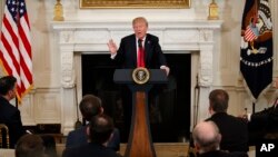 President Donald Trump speaks during a meeting with the members of the National Governors Association in the State Dining Room of the White House, Feb. 26, 2018, in Washington.