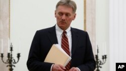 FILE - Kremlin spokesman Dmitry Peskov is seen at the Kremlin in Moscow, Russia, March 27, 2017.