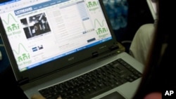 A Cambodian Web log user, or blogger, surfs her blog during the Cambodian Bloggers Summit in Phnom Penh. 