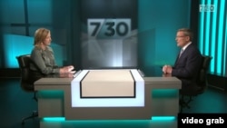 Australian Secret Intelligence Service director-general Paul Symon speaks to Australian Broadcasting Corporation host Leigh Sales during a televised interview.