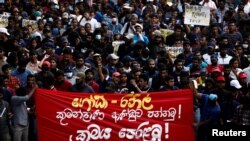 Members of Inter University Students' Federation shout slogans against Sri Lanka's President Gotabaya Rajapaksa demanding him to step down, amid the country's economic crisis, in Colombo, Sri Lanka, June 20, 2022. 