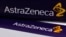 FILE - The logo of AstraZeneca is seen on medication packages in a pharmacy in London. Apr. 28, 2014.
