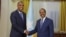 Somalia's President Hassan Sheikh Mohamud poses for a photograph with newly appointed Prime Minister Hamza Abdi Barre at the Presidential Palace in Mogadishu, Somalia, June 15, 2022. 